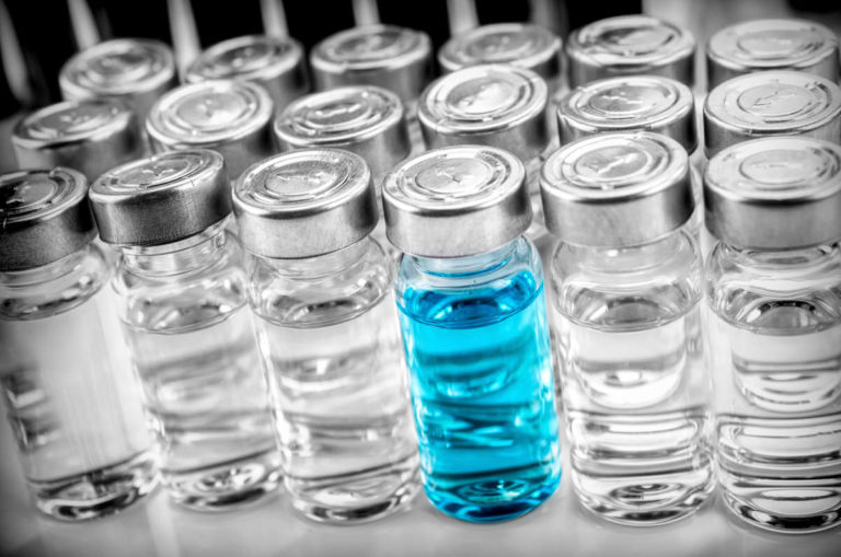 Blue liquid vial with clear vials